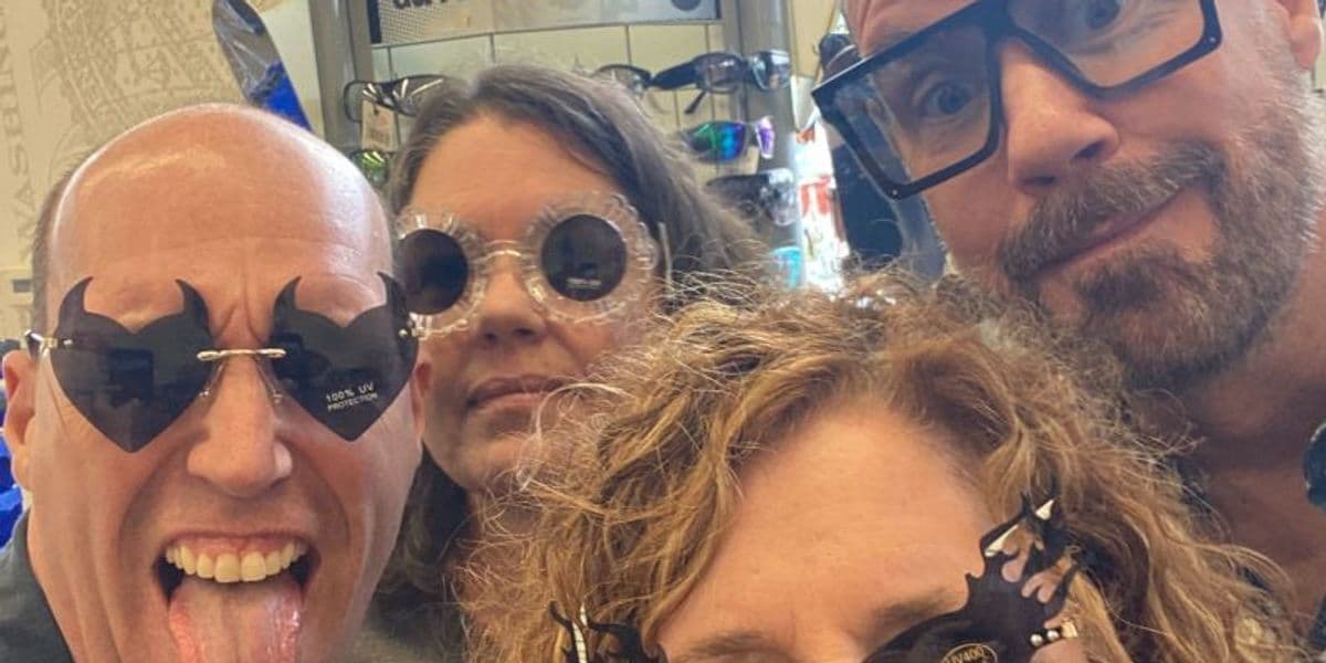 Four people dressed up for Halloween