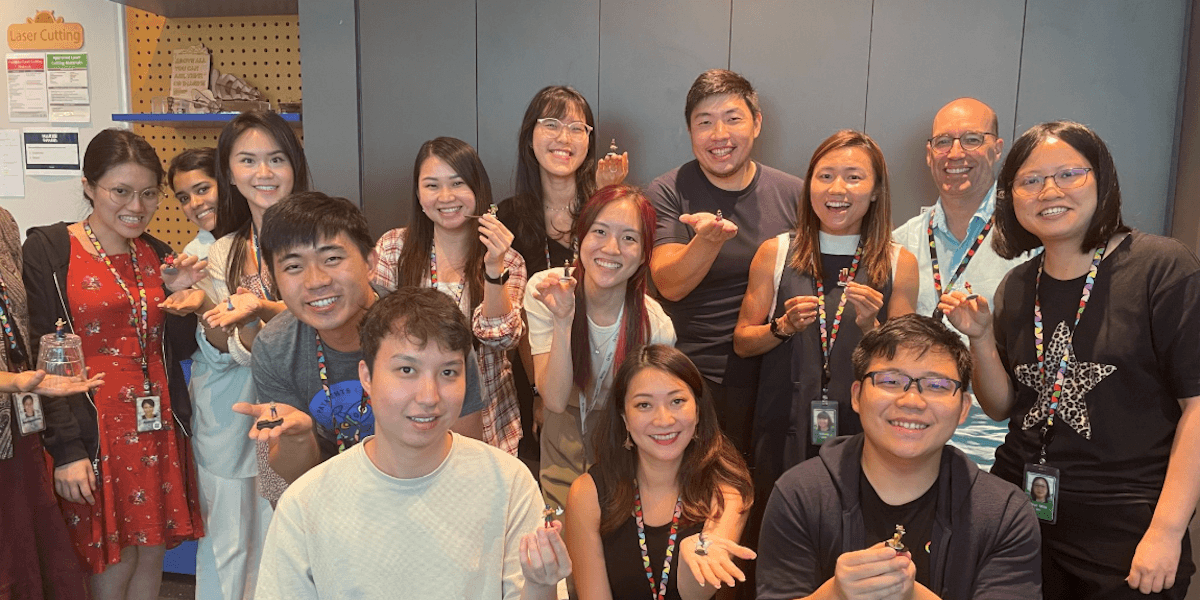 Group of employees with Brian at the Makerspace at Google Singapore