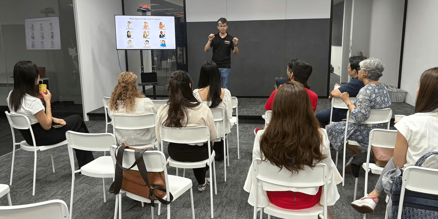 Tom presenting at a demo event at Teamwork Unlocked
