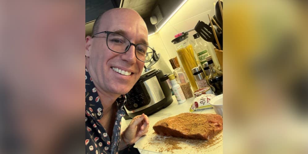 Brian making a pie in the kitchen